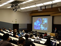 Prof. Joseph Sung delivers a lecture at the University of Washington.